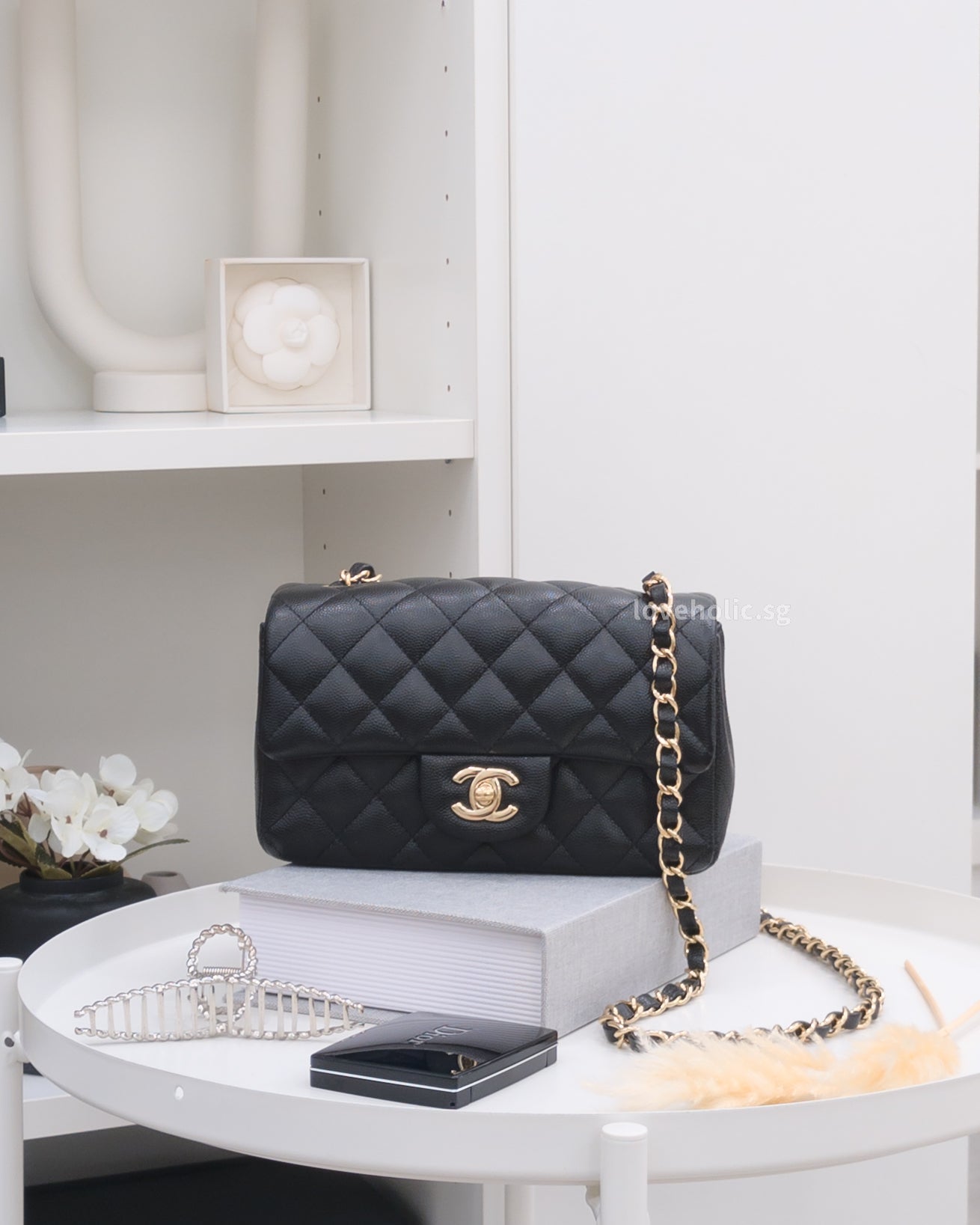 Chanel - authentic luxury pieces curated by Loveholic