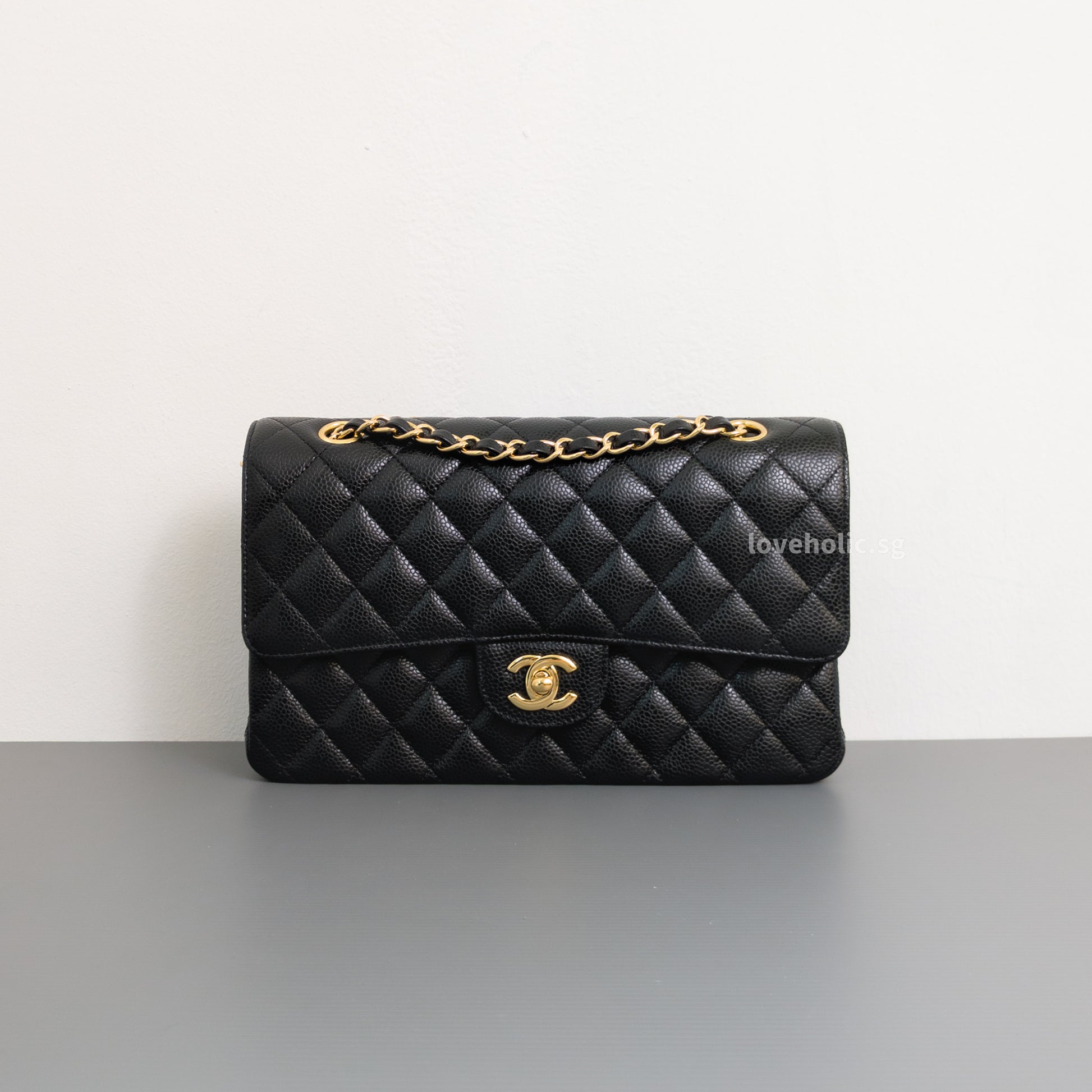 Chanel Classic Flap Medium | Black Caviar Gold Hardware-front1