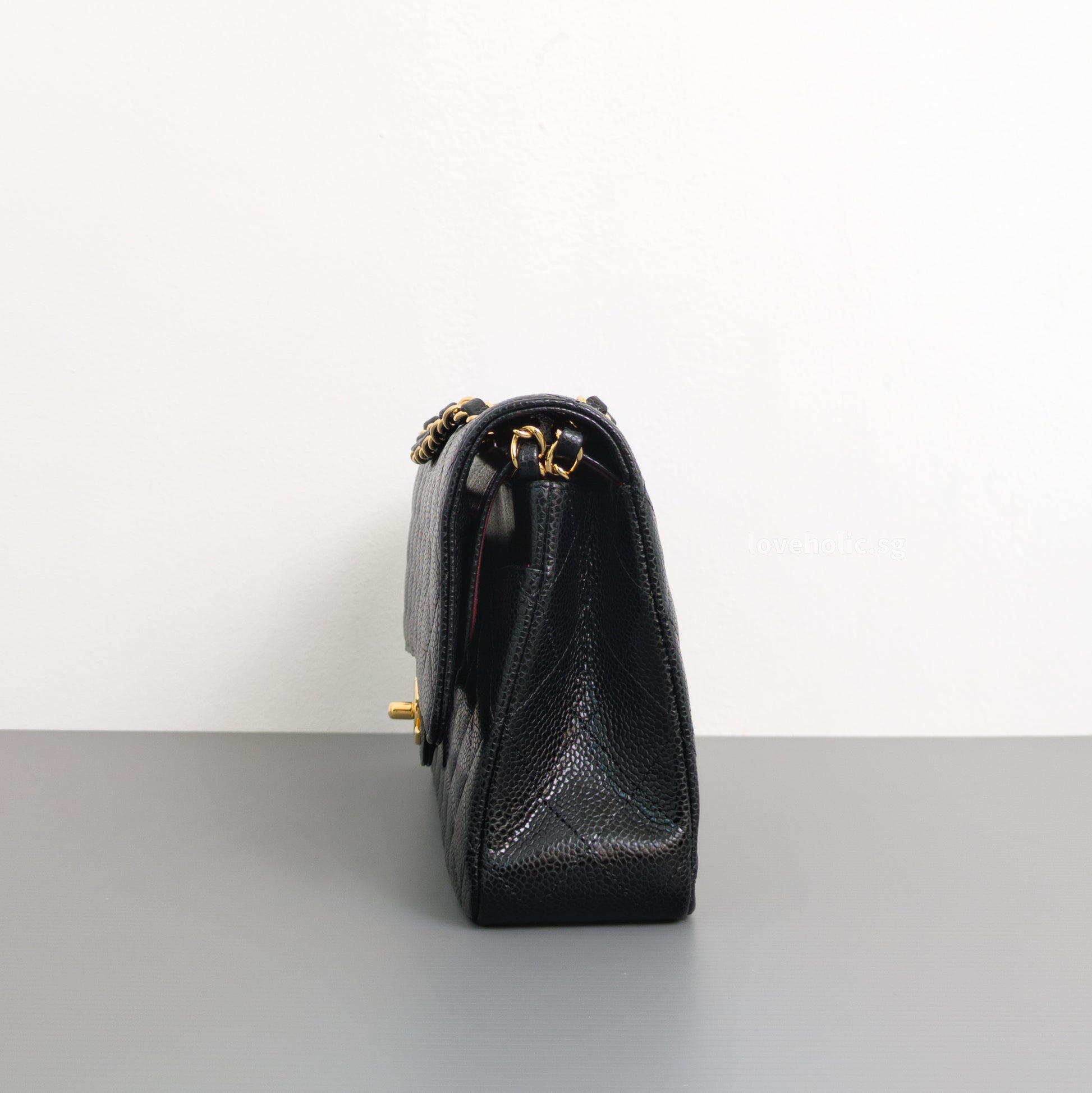 Chanel Classic Flap Medium | Black Caviar Gold Hardware-side