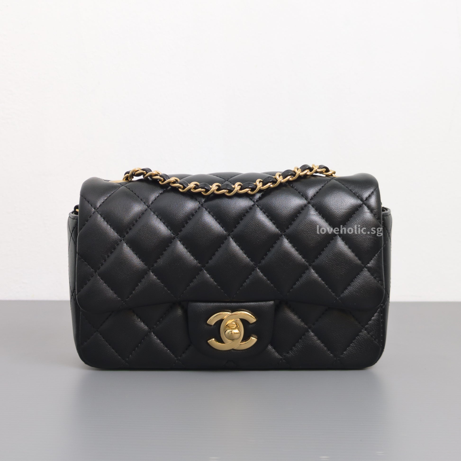 Chanel Mini Flap Bag 24K Black Lambskin Light Gold Hardware-front1