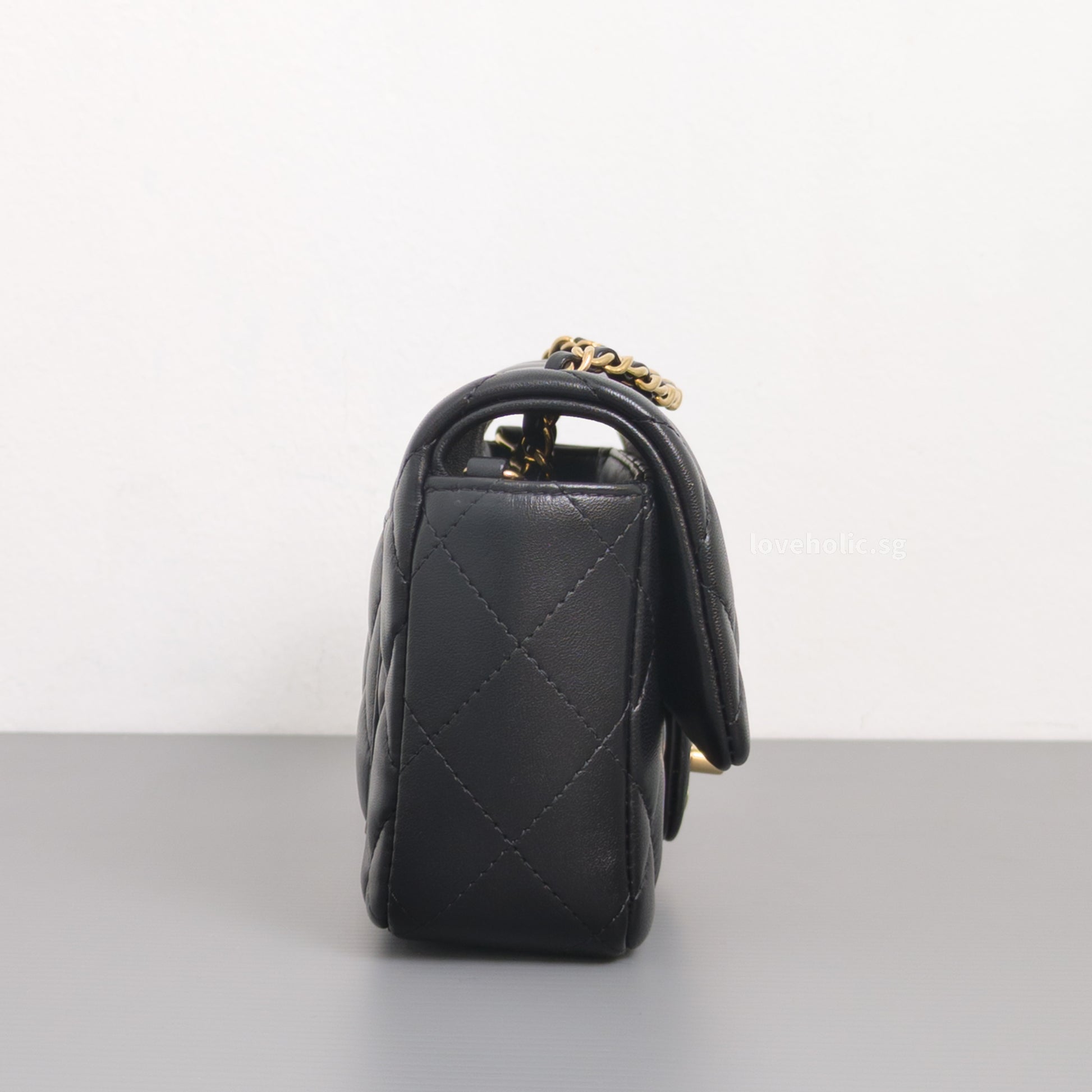 Chanel Mini Flap Bag 24K Black Lambskin Light Gold Hardware-details