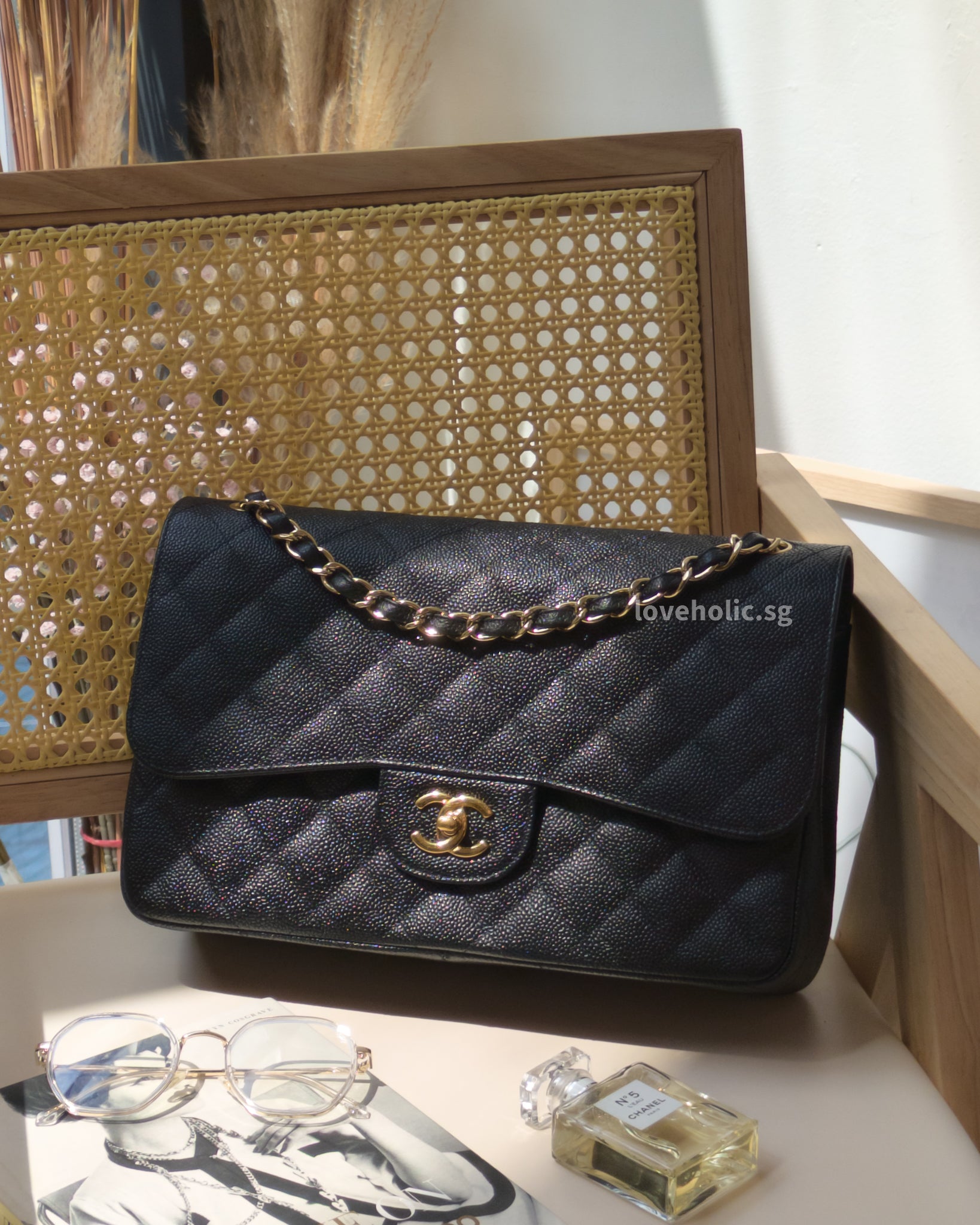 Chanel Classic Flap Jumbo | Black Caviar Gold Hardware-front