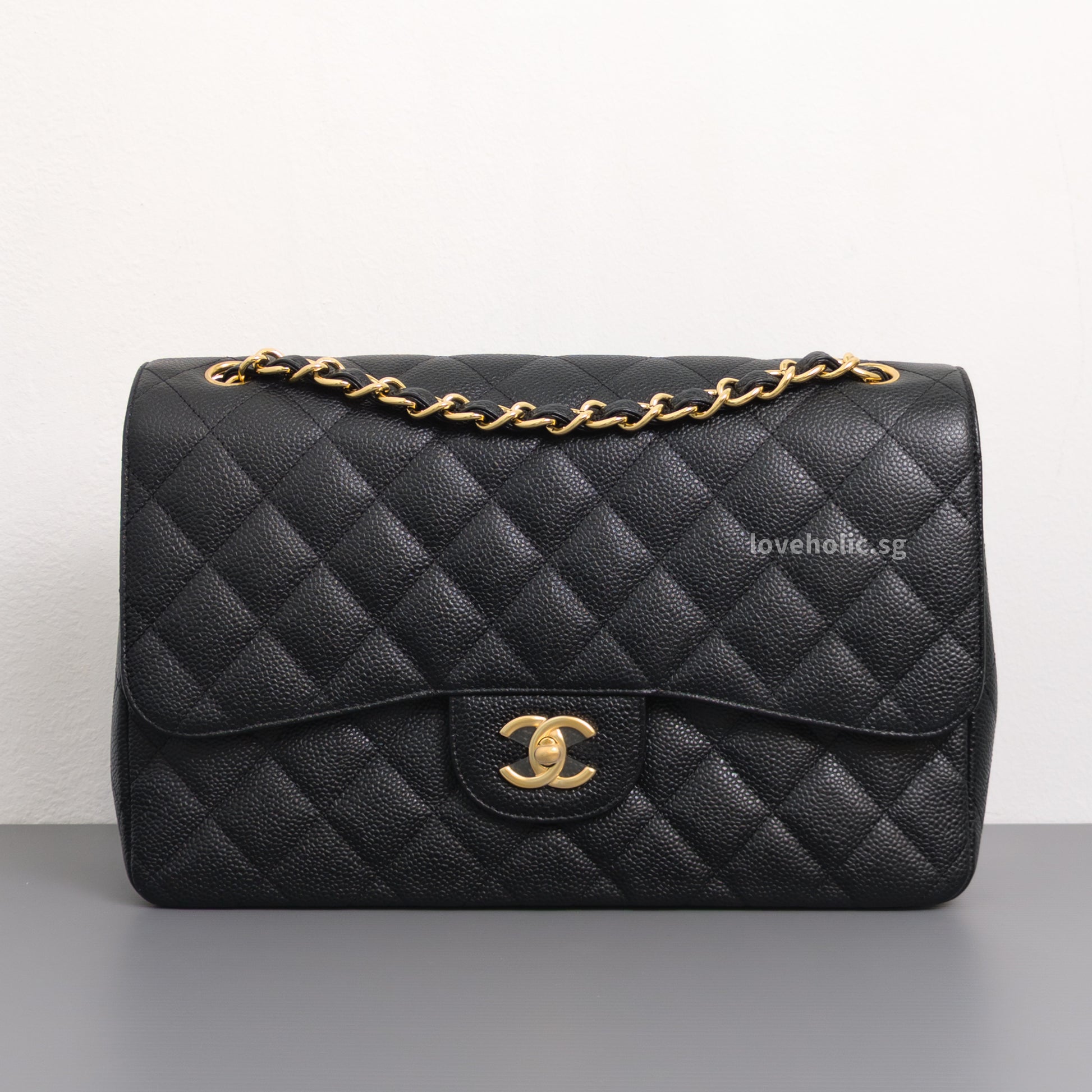 Chanel Classic Flap Jumbo | Black Caviar Gold Hardware-front1