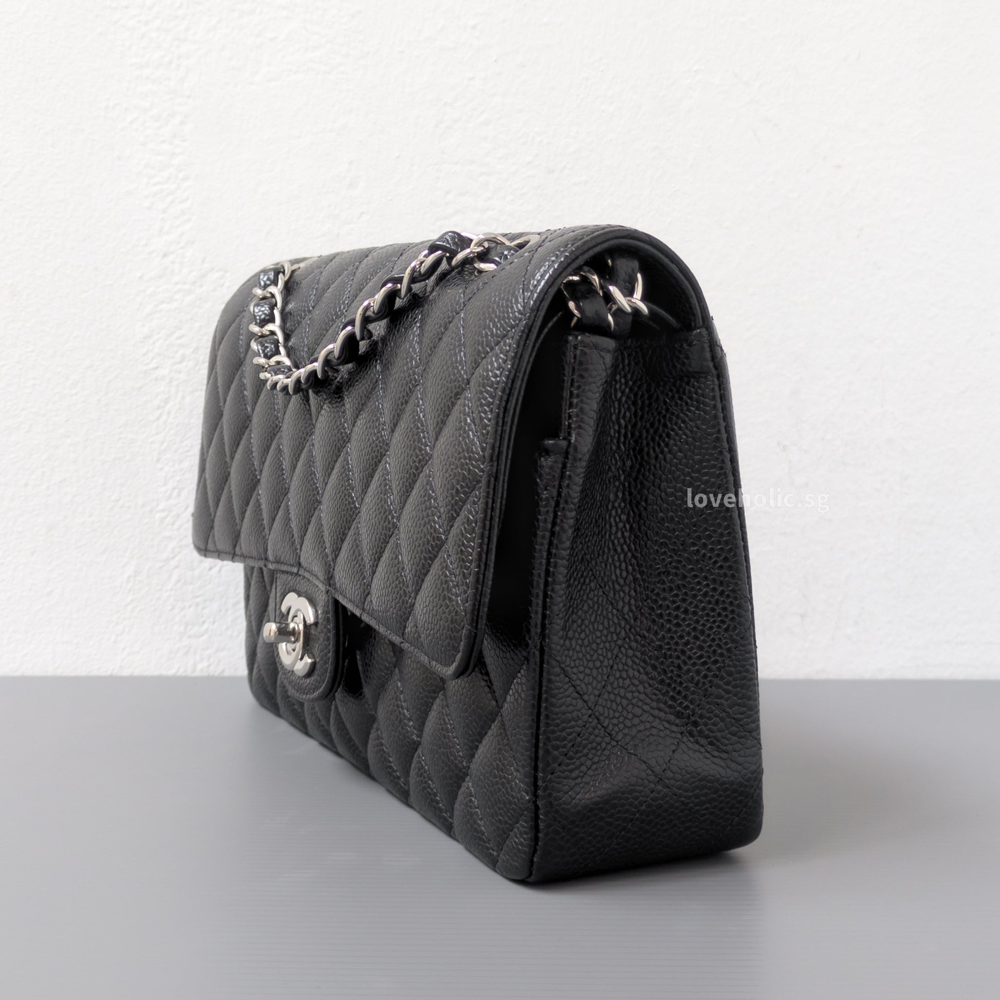 Chanel Classic Flap Medium | Black Caviar Silver Hardware-side