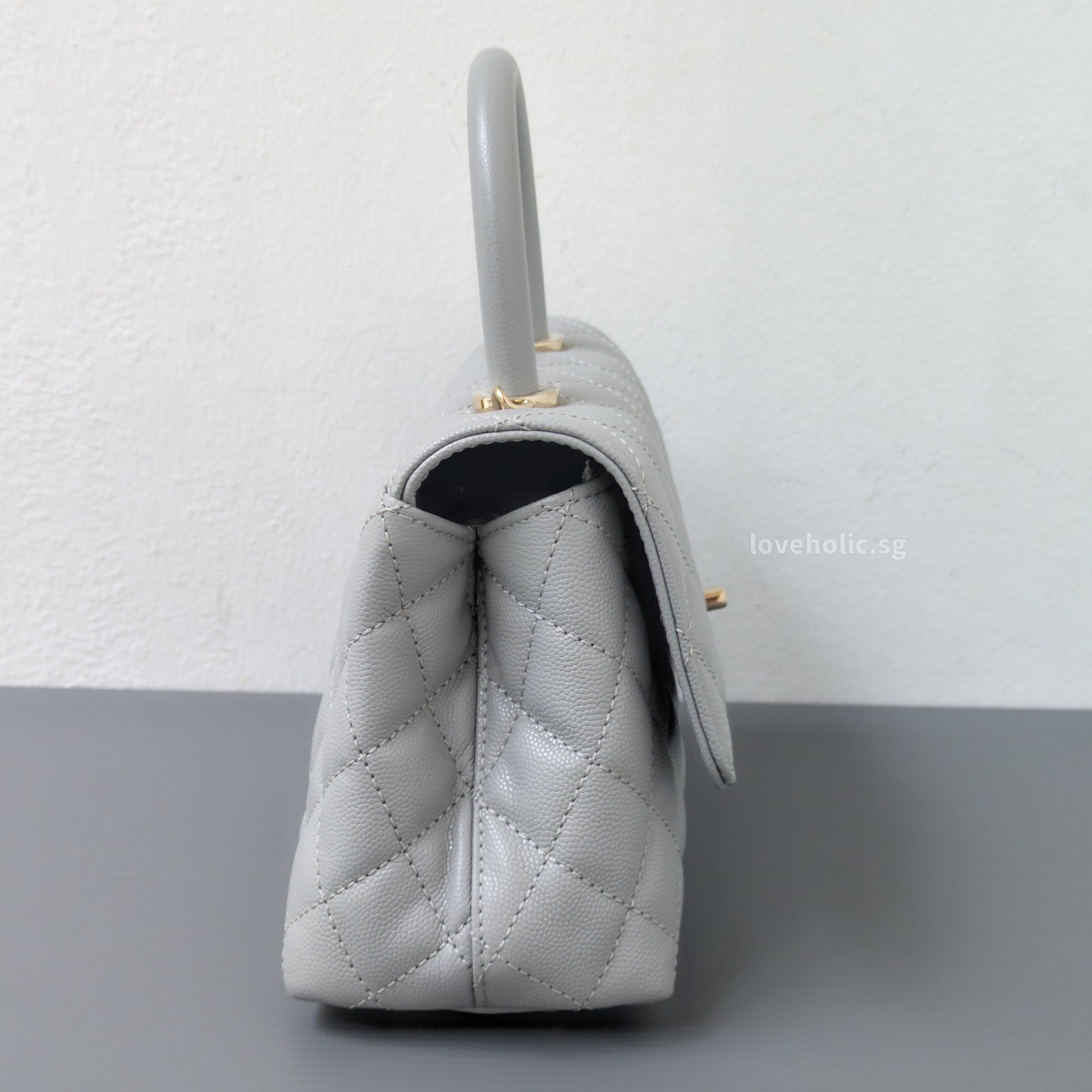 Chanel Coco Handle Small | 24K Grey Caviar Light Gold Hardware-side