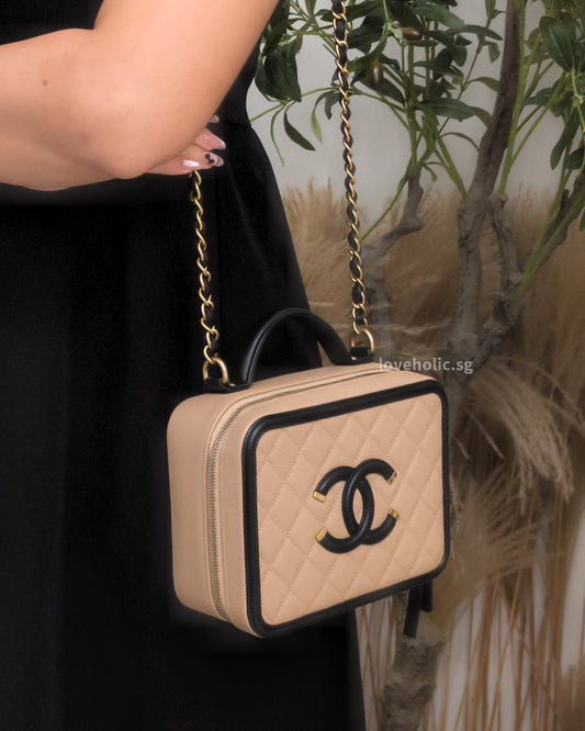 Chanel Filigree Vanity Case Medium | Beige x Black Caviar Brushed Gold Hardware-model