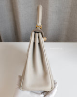 Kelly Retourne 25  | Beton Togo Gold Hardware