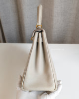 Kelly Retourne 25  | Beton Togo Gold Hardware