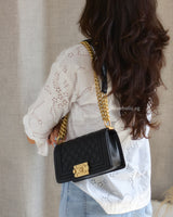 Chanel Boy Small | Black Caviar Brushed Gold Hardware-model