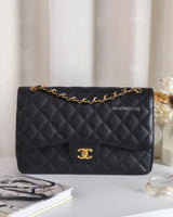Chanel Classic Flap Jumbo | Black Caviar Gold Hardware-front