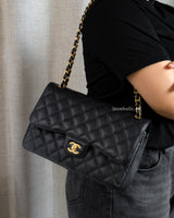 Chanel Classic Flap Jumbo | Black Caviar Gold Hardware-model