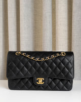 Chanel Classic Flap Medium | Black Caviar Gold Hardware-front1