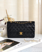 Chanel Classic Flap Medium | Black Caviar Gold Hardware-front