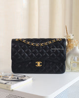 Chanel Classic Flap Jumbo | Black Caviar Gold Hardware-front