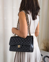 Chanel Classic Flap Jumbo | Black Caviar Gold Hardware-model
