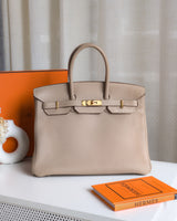 Hermes Birkin Retourne 35 | Trench Togo Gold Hardware-front