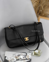 Chanel Maxi Flap 32cm | 26A Black Caviar Gold Hardware-front