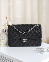 Chanel Classic Flap Jumbo | Black Caviar Silver Hardware-front