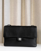 Chanel Maxi Flap 38cm  | 26A Black Caviar Silver Hardware-front1