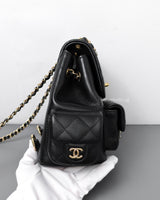 Chanel Duma Backpack Small | 23K Black Caviar Gold Hardware-side