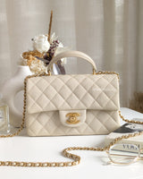 Chanel Mini Rectangle with Top Handle 21S Ivory White Caviar Brushed Gold Hardware-front