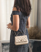 Chanel Top Handle Flap Bag 25S Beige Caviar Light Gold Hardware-model