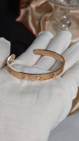 Love Bracelet with 1 Pink Sapphire Open Classic Model Size 18 | 18K Rose Gold