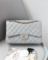 Chanel Classic Flap Jumbo | 21A Light Grey Caviar Gold Hardware